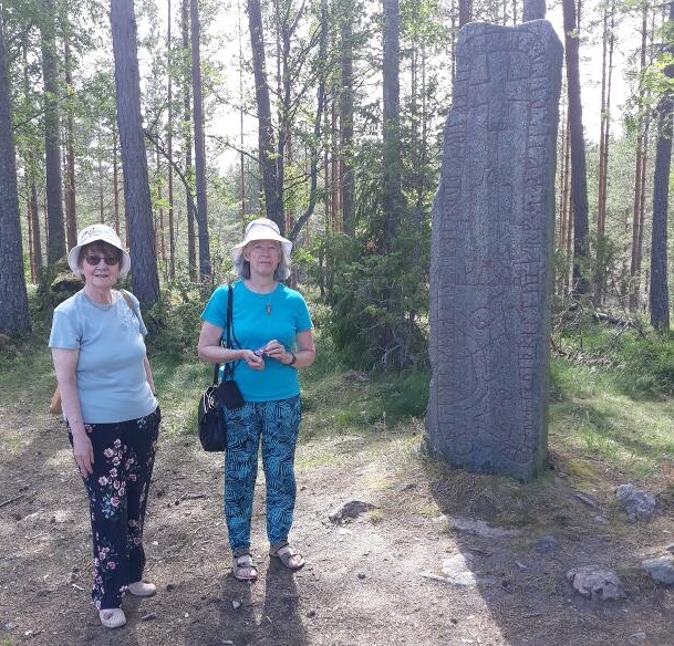 rune stone and people