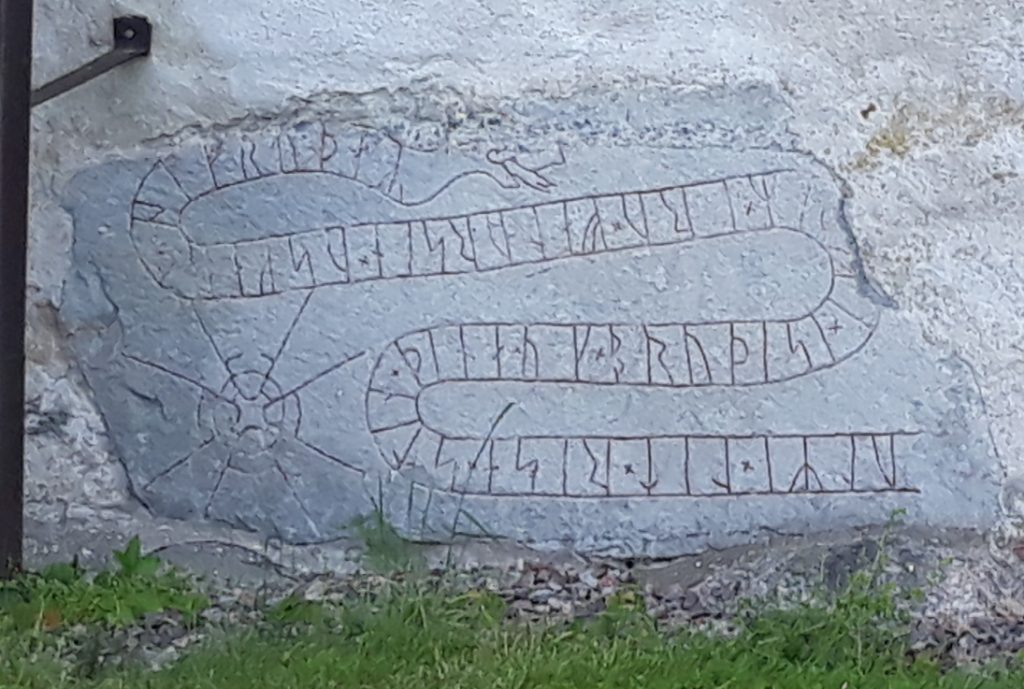 rune stone in church wall