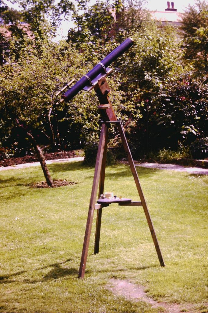 telescope on old tripod